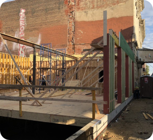 BuildSMART-Building-SMART-Build-SMART-J-Form-Underslab-Insulation-Vapor-Barrier-Gravel-Bed-and-concrete-slab-on-grade-contractor-Horizontal-Wing-Insulation-high-performance-wall-panel-building-envelope-E-Wall-buildsmartna.com-Passive-House-energy-efficiency-net-zero-J-Form-insulated-permanent-shallow-foundation-Form-System-prefabrication-prefab-modular-construction-Developer-Architect-Builder-Homeowner-Exterior-Wall-Panel-Interior-Frame-Walls-Single-Family-Multifamily-Senior-Living-Assisted-Care-Daycare-Clinic-Student-Living-School-Office-Hospitality-Mixed-Use-Slab-On-Grade-Crawl-Space-Basement-Piers-Column-Walk-Out-Basement-Energy-Star-LEED-WELL-Living-Building-Challenge-FORTIFIED-Thermal-Efficiency-Labor-Savings-Low-risk-air-barrier-and-very-low-infiltration-rates-severe-weather-survivability-sound-attenuation-and-a-quiet-secure-feeling-inside-low-cost-of-ownership-optimized-construction-cost-and-operation-cost-total-cost-of-ownership-optimized-cash-flow-and-return-on-investment-construction-drawings-Floor-Plans-scale-and-dimension- Elevations-Wall-Section-Window-Door-Schedule-Section Details-Lender-Structural Engineer-MEP Engineer-Energy Modeler-Energy-Rater-Resilience-zero-carbon-Panelized-Passive-House-Multifamily-Prefabricated-Modular-Offsite-construction-Off-site-construction-Code-comparison-Financial-analysis-Return-on-investment-ROI-Internal-rate-of-return-IRR-Real-estate-valuation-Cash-flow-Pro-forma-Financial-terms-in-attached-documents-Noise-Sound-proofing-NIMBY-Health -Ventilation-Section-8-Voucher-program-Build-to-Rent-All-AIA-education-credits-Health-Safety-Welfare-credits-HSW-NIMBY-Ventilation-Noise-Soundproofing