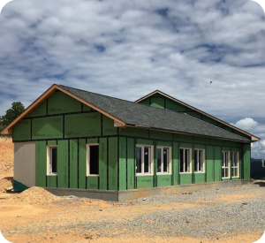 BuildSMART-Building-SMART-Build-SMART-J-Form-Underslab-Insulation-Vapor-Barrier-Gravel-Bed-and-concrete-slab-on-grade-contractor-Horizontal-Wing-Insulation-high-performance-wall-panel-building-envelope-E-Wall-buildsmartna.com-Passive-House-energy-efficiency-net-zero-J-Form-insulated-permanent-shallow-foundation-Form-System-prefabrication-prefab-modular-construction-Developer-Architect-Builder-Homeowner-Exterior-Wall-Panel-Interior-Frame-Walls-Single-Family-Multifamily-Senior-Living-Assisted-Care-Daycare-Clinic-Student-Living-School-Office-Hospitality-Mixed-Use-Slab-On-Grade-Crawl-Space-Basement-Piers-Column-Walk-Out-Basement-Energy-Star-LEED-WELL-Living-Building-Challenge-FORTIFIED-Thermal-Efficiency-Labor-Savings-Low-risk-air-barrier-and-very-low-infiltration-rates-severe-weather-survivability-sound-attenuation-and-a-quiet-secure-feeling-inside-low-cost-of-ownership-optimized-construction-cost-and-operation-cost-total-cost-of-ownership-optimized-cash-flow-and-return-on-investment-construction-drawings-Floor-Plans-scale-and-dimension- Elevations-Wall-Section-Window-Door-Schedule-Section Details-Lender-Structural Engineer-MEP Engineer-Energy Modeler-Energy-Rater-Resilience-zero-carbon-Panelized-Passive-House-Multifamily-Prefabricated-Modular-Offsite-construction-Off-site-construction-Code-comparison-Financial-analysis-Return-on-investment-ROI-Internal-rate-of-return-IRR-Real-estate-valuation-Cash-flow-Pro-forma-Financial-terms-in-attached-documents-Noise-Sound-proofing-NIMBY-Health -Ventilation-Section-8-Voucher-program-Build-to-Rent-All-AIA-education-credits-Health-Safety-Welfare-credits-HSW-NIMBY-Ventilation-Noise-Soundproofing