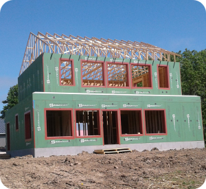 BuildSMART-Building-SMART-Build-SMART-J-Form-Underslab-Insulation-Vapor-Barrier-Gravel-Bed-and-concrete-slab-on-grade-contractor-Horizontal-Wing-Insulation-high-performance-wall-panel-building-envelope-E-Wall-buildsmartna.com-Passive-House-energy-efficiency-net-zero-J-Form-insulated-permanent-shallow-foundation-Form-System-prefabrication-prefab-modular-construction-Developer-Architect-Builder-Homeowner-Exterior-Wall-Panel-Interior-Frame-Walls-Single-Family-Multifamily-Senior-Living-Assisted-Care-Daycare-Clinic-Student-Living-School-Office-Hospitality-Mixed-Use-Slab-On-Grade-Crawl-Space-Basement-Piers-Column-Walk-Out-Basement-Energy-Star-LEED-WELL-Living-Building-Challenge-FORTIFIED-Thermal-Efficiency-Labor-Savings-Low-risk-air-barrier-and-very-low-infiltration-rates-severe-weather-survivability-sound-attenuation-and-a-quiet-secure-feeling-inside-low-cost-of-ownership-optimized-construction-cost-and-operation-cost-total-cost-of-ownership-optimized-cash-flow-and-return-on-investment-construction-drawings-Floor-Plans-scale-and-dimension- Elevations-Wall-Section-Window-Door-Schedule-Section Details-Lender-Structural Engineer-MEP Engineer-Energy Modeler-Energy-Rater-Resilience-zero-carbon-Panelized-Passive-House-Multifamily-Prefabricated-Modular-Offsite-construction-Off-site-construction-Code-comparison-Financial-analysis-Return-on-investment-ROI-Internal-rate-of-return-IRR-Real-estate-valuation-Cash-flow-Pro-forma-Financial-terms-in-attached-documents-Noise-Sound-proofing-NIMBY-Health -Ventilation-Section-8-Voucher-program-Build-to-Rent-All-AIA-education-credits-Health-Safety-Welfare-credits-HSW-NIMBY-Ventilation-Noise-Soundproofing