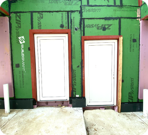 BuildSMART-Building-SMART-Build-SMART-J-Form-Underslab-Insulation-Vapor-Barrier-Gravel-Bed-and-concrete-slab-on-grade-contractor-Horizontal-Wing-Insulation-high-performance-wall-panel-building-envelope-E-Wall-buildsmartna.com-Passive-House-energy-efficiency-net-zero-J-Form-insulated-permanent-shallow-foundation-Form-System-prefabrication-prefab-modular-construction-Developer-Architect-Builder-Homeowner-Exterior-Wall-Panel-Interior-Frame-Walls-Single-Family-Multifamily-Senior-Living-Assisted-Care-Daycare-Clinic-Student-Living-School-Office-Hospitality-Mixed-Use-Slab-On-Grade-Crawl-Space-Basement-Piers-Column-Walk-Out-Basement-Energy-Star-LEED-WELL-Living-Building-Challenge-FORTIFIED-Thermal-Efficiency-Labor-Savings-Low-risk-air-barrier-and-very-low-infiltration-rates-severe-weather-survivability-sound-attenuation-and-a-quiet-secure-feeling-inside-low-cost-of-ownership-optimized-construction-cost-and-operation-cost-total-cost-of-ownership-optimized-cash-flow-and-return-on-investment-construction-drawings-Floor-Plans-scale-and-dimension- Elevations-Wall-Section-Window-Door-Schedule-Section Details-Lender-Structural Engineer-MEP Engineer-Energy Modeler-Energy-Rater-Resilience-zero-carbon-Panelized-Passive-House-Multifamily-Prefabricated-Modular-Offsite-construction-Off-site-construction-Code-comparison-Financial-analysis-Return-on-investment-ROI-Internal-rate-of-return-IRR-Real-estate-valuation-Cash-flow-Pro-forma-Financial-terms-in-attached-documents-Noise-Sound-proofing-NIMBY-Health -Ventilation-Section-8-Voucher-program-Build-to-Rent-All-AIA-education-credits-Health-Safety-Welfare-credits-HSW-NIMBY-Ventilation-Noise-Soundproofing