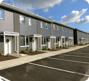 BuildSMART-Building-SMART-Build-SMART-J-Form-Underslab-Insulation-Vapor-Barrier-Gravel-Bed-and-concrete-slab-on-grade-contractor-Horizontal-Wing-Insulation-high-performance-wall-panel-building-envelope-E-Wall-buildsmartna.com-Passive-House-energy-efficiency-net-zero-J-Form-insulated-permanent-shallow-foundation-Form-System-prefabrication-prefab-modular-construction-Developer-Architect-Builder-Homeowner-Exterior-Wall-Panel-Interior-Frame-Walls-Single-Family-Multifamily-Senior-Living-Assisted-Care-Daycare-Clinic-Student-Living-School-Office-Hospitality-Mixed-Use-Slab-On-Grade-Crawl-Space-Basement-Piers-Column-Walk-Out-Basement-Energy-Star-LEED-WELL-Living-Building-Challenge-FORTIFIED-Thermal-Efficiency-Labor-Savings-Low-risk-air-barrier-and-very-low-infiltration-rates-severe-weather-survivability-sound-attenuation-and-a-quiet-secure-feeling-inside-low-cost-of-ownership-optimized-construction-cost-and-operation-cost-total-cost-of-ownership-optimized-cash-flow-and-return-on-investment-construction-drawings-Floor-Plans-scale-and-dimension- Elevations-Wall-Section-Window-Door-Schedule-Section Details-Lender-Structural Engineer-MEP Engineer-Energy Modeler-Energy-Rater-Resilience-zero-carbon-Panelized-Passive-House-Multifamily-Prefabricated-Modular-Offsite-construction-Off-site-construction-Code-comparison-Financial-analysis-Return-on-investment-ROI-Internal-rate-of-return-IRR-Real-estate-valuation-Cash-flow-Pro-forma-Financial-terms-in-attached-documents-Noise-Sound-proofing-NIMBY-Health -Ventilation-Section-8-Voucher-program-Build-to-Rent-All-AIA-education-credits-Health-Safety-Welfare-credits-HSW-NIMBY-Ventilation-Noise-Soundproofing