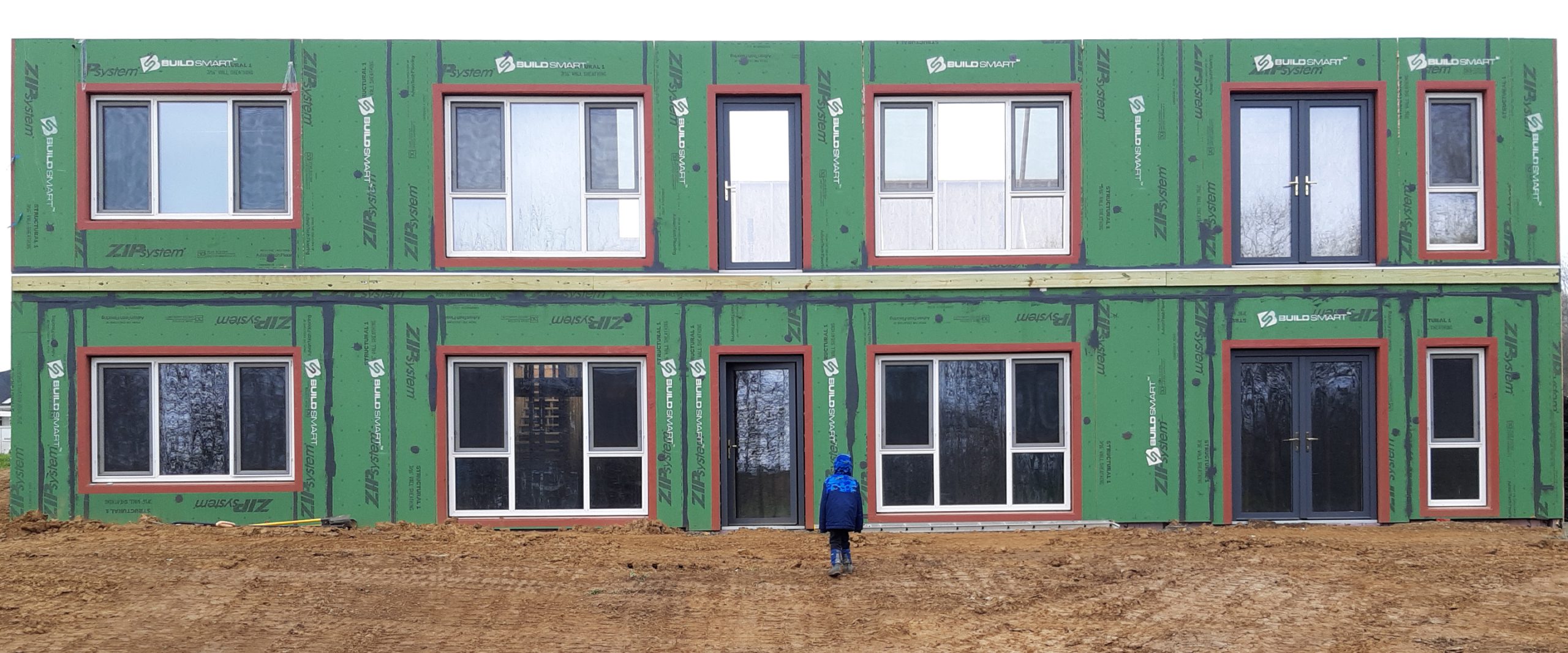 BuildSMART-Building-SMART-Build-SMART-J-Form-Underslab-Insulation-Vapor-Barrier-Gravel-Bed-and-concrete-slab-on-grade-contractor-Horizontal-Wing-Insulation-high-performance-wall-panel-building-envelope-E-Wall-buildsmartna.com-Passive-House-energy-efficiency-net-zero-J-Form-insulated-permanent-shallow-foundation-Form-System-prefabrication-prefab-modular-construction-Developer-Architect-Builder-Homeowner-Exterior-Wall-Panel-Interior-Frame-Walls-Single-Family-Multifamily-Senior-Living-Assisted-Care-Daycare-Clinic-Student-Living-School-Office-Hospitality-Mixed-Use-Slab-On-Grade-Crawl-Space-Basement-Piers-Column-Walk-Out-Basement-Energy-Star-LEED-WELL-Living-Building-Challenge-FORTIFIED-Thermal-Efficiency-Labor-Savings-Low-risk-air-barrier-and-very-low-infiltration-rates-severe-weather-survivability-sound-attenuation-and-a-quiet-secure-feeling-inside-low-cost-of-ownership-optimized-construction-cost-and-operation-cost-total-cost-of-ownership-optimized-cash-flow-and-return-on-investment-construction-drawings-Floor-Plans-scale-and-dimension- Elevations-Wall-Section-Window-Door-Schedule-Section Details-Lender-Structural Engineer-MEP Engineer-Energy Modeler-Energy-Rater-Resilience-zero-carbon-Panelized-Passive-House-Multifamily-Prefabricated-Modular-Offsite-construction-Off-site-construction-Code-comparison-Financial-analysis-Return-on-investment-ROI-Internal-rate-of-return-IRR-Real-estate-valuation-Cash-flow-Pro-forma-Financial-terms-in-attached-documents-Noise-Sound-proofing-NIMBY-Health -Ventilation-Section-8-Voucher-program-Build-to-Rent-All-AIA-education-credits-Health-Safety-Welfare-credits-HSW-NIMBY-Ventilation-Noise-Soundproofing