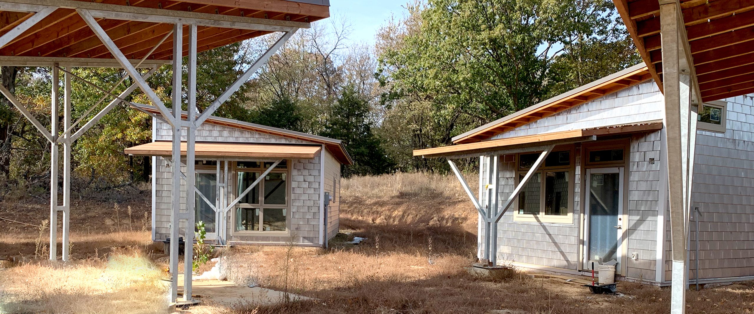 BuildSMART-Building-SMART-Build-SMART-J-Form-Underslab-Insulation-Vapor-Barrier-Gravel-Bed-and-concrete-slab-on-grade-contractor-Horizontal-Wing-Insulation-high-performance-wall-panel-building-envelope-E-Wall-buildsmartna.com-Passive-House-energy-efficiency-net-zero-J-Form-insulated-permanent-shallow-foundation-Form-System-prefabrication-prefab-modular-construction-Developer-Architect-Builder-Homeowner-Exterior-Wall-Panel-Interior-Frame-Walls-Single-Family-Multifamily-Senior-Living-Assisted-Care-Daycare-Clinic-Student-Living-School-Office-Hospitality-Mixed-Use-Slab-On-Grade-Crawl-Space-Basement-Piers-Column-Walk-Out-Basement-Energy-Star-LEED-WELL-Living-Building-Challenge-FORTIFIED-Thermal-Efficiency-Labor-Savings-Low-risk-air-barrier-and-very-low-infiltration-rates-severe-weather-survivability-sound-attenuation-and-a-quiet-secure-feeling-inside-low-cost-of-ownership-optimized-construction-cost-and-operation-cost-total-cost-of-ownership-optimized-cash-flow-and-return-on-investment-construction-drawings-Floor-Plans-scale-and-dimension- Elevations-Wall-Section-Window-Door-Schedule-Section Details-Lender-Structural Engineer-MEP Engineer-Energy Modeler-Energy-Rater-Resilience-zero-carbon-Panelized-Passive-House-Multifamily-Prefabricated-Modular-Offsite-construction-Off-site-construction-Code-comparison-Financial-analysis-Return-on-investment-ROI-Internal-rate-of-return-IRR-Real-estate-valuation-Cash-flow-Pro-forma-Financial-terms-in-attached-documents-Noise-Sound-proofing-NIMBY-Health-Covid-19-Ventilation-Section-8-Voucher-program-Build-to-Rent-All-AIA-education-credits-Health-Safety-Welfare-credits-HSW-NIMBY-Covid-19-Ventilation-Noise-Soundproofing